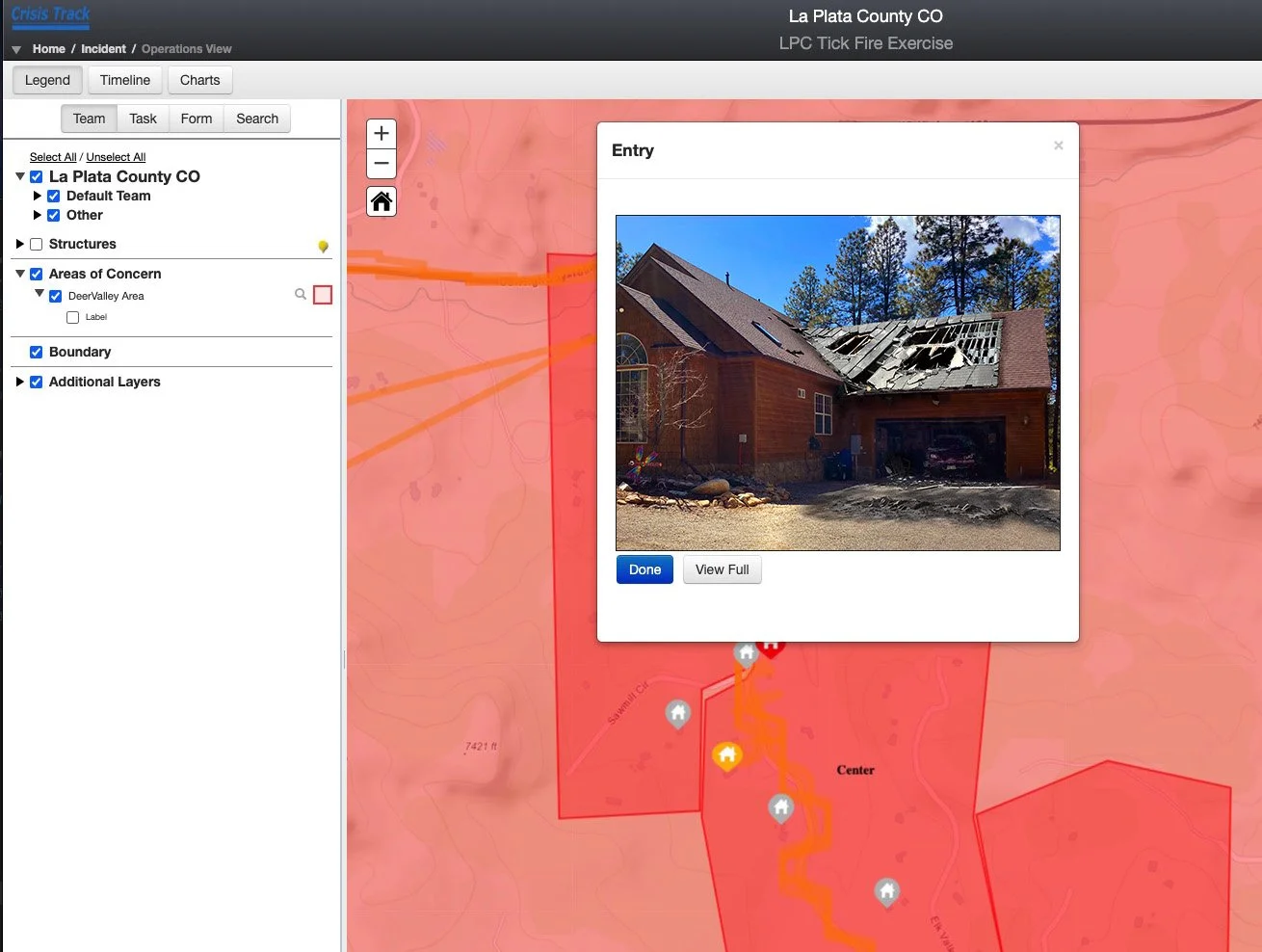 Juvare's Crisis Track Damage Assessment Software Platform. Example of an assessor capturing simulated damaged residence imagery on site, as if it was real-world damage.