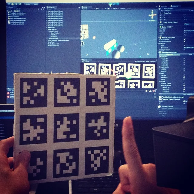 Calibration. QR code calibration, the 'old fashioned way.' Not elegant but usually reliable. Early stages of augmented reality.
